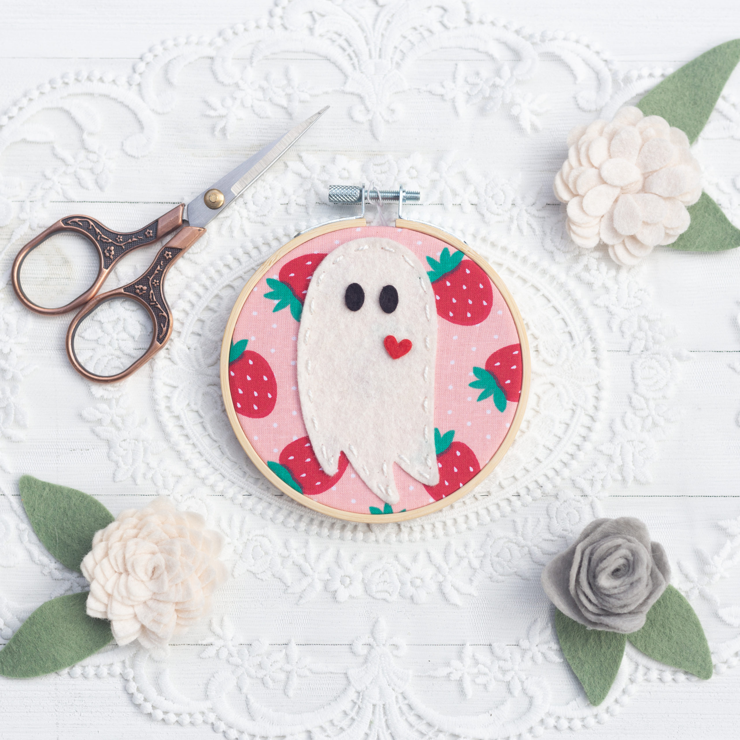 Wool felt ghost in an antique 4 inch embroidery hoop