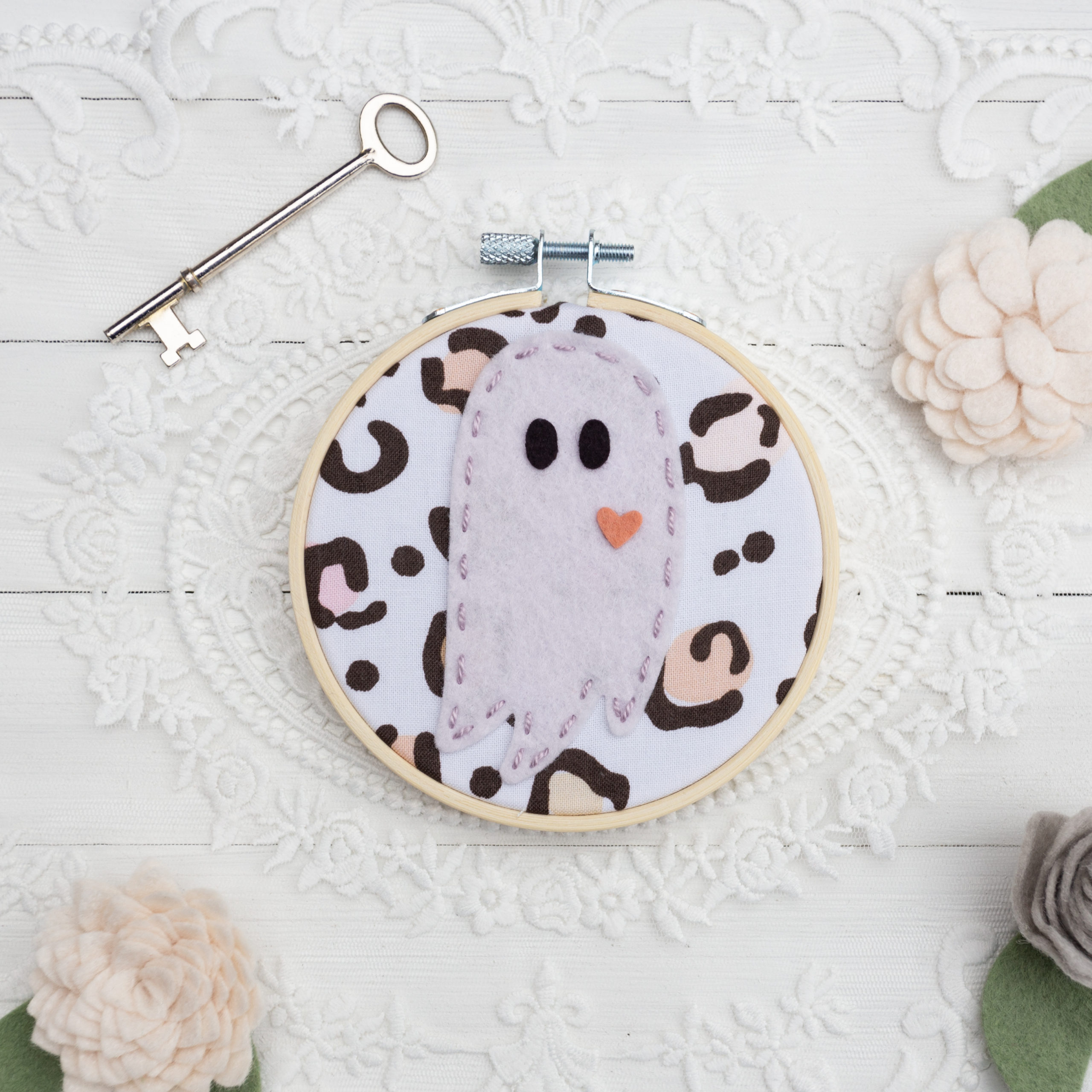 Wool felt ghost in an antique 4 inch embroidery hoop
